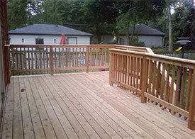 A large pine deck is an ideal outdoor living space for this Oak Park home.
